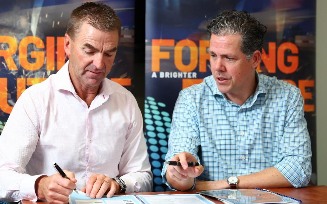 Chairman Nick Trompf and TTNQ CEO Mark Olsen review the Advance Cairns Federal Budget submission